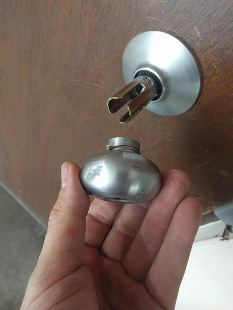 A doorknob that was broken off with pliers or vicegrips